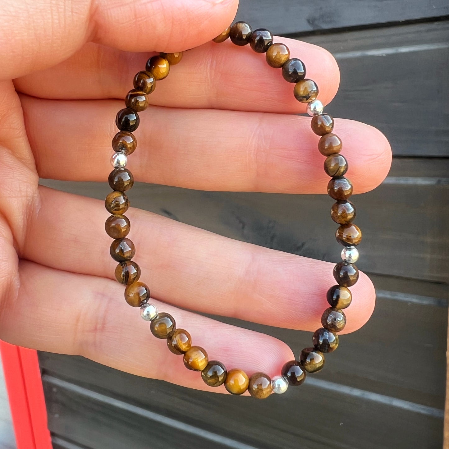 PULSERA ELASTICADA "FUERZA INTERIOR Y SEGURIDAD" | Ojo de tigre | Plata 925